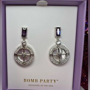 Silver and Purple Earrings
ATLANTIS-FIND THE MAGIC